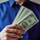 how much do you have to earn to pay back student loan